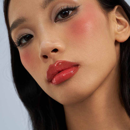 Pink Flare glossy pink lip look on a light skin tone